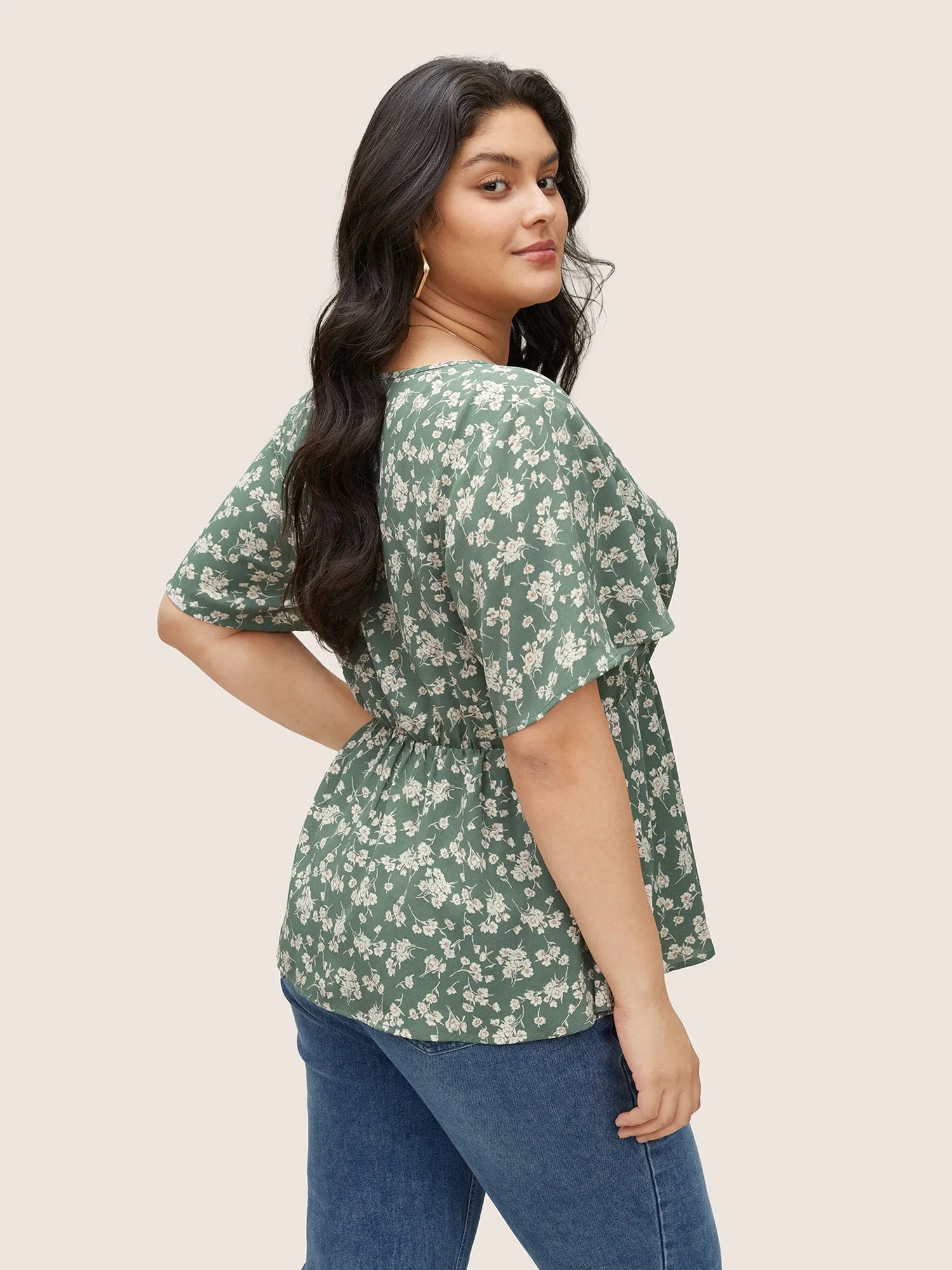 Ditsy Floral Elastic Waist Wrap Asymmetrical Hem Blouse sold by Bloomchic product image thumbnail 4