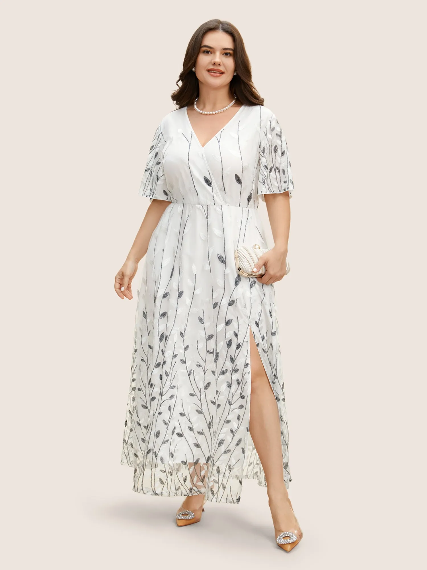 Sequin Mesh Embroidered Wrap Split Hem Dress sold by Bloomchic
