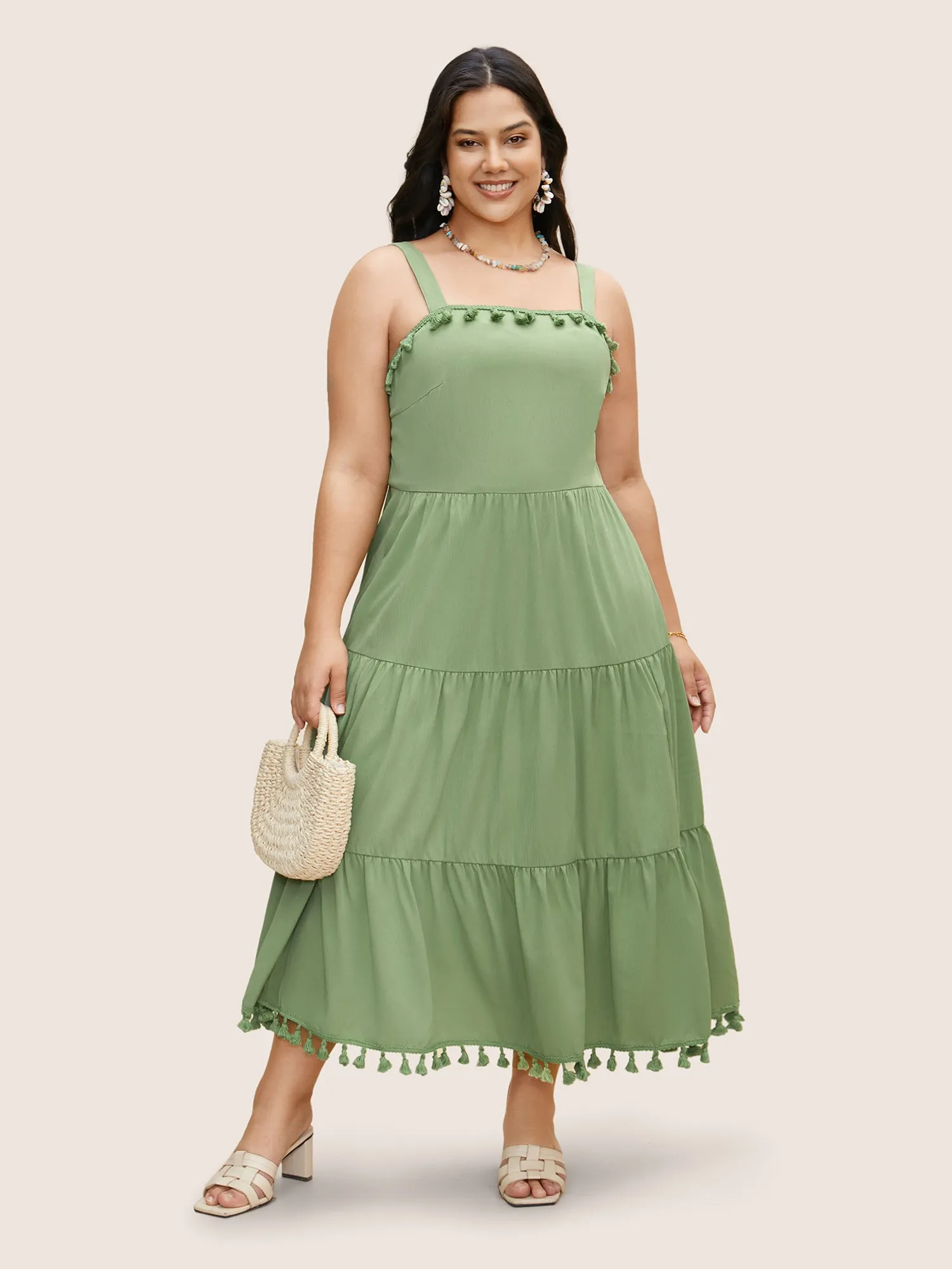 Solid Ruffle Layered Hem Tassel Trim Dress sold by Bloomchic