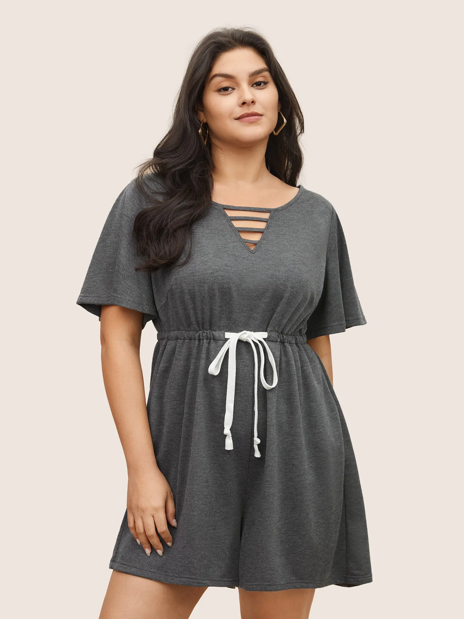 Solid Keyhole Drawstring Pocket Jumpsuit sold by Bloomchic