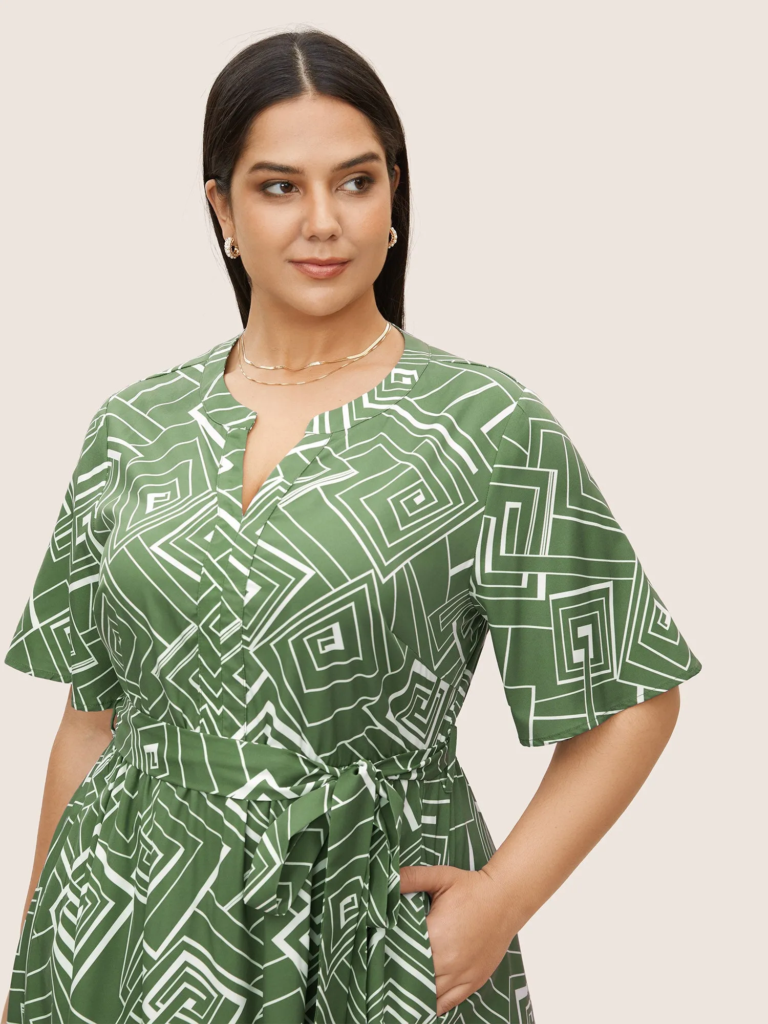 Geometric Flat Collar With V Notch Ruffle Sleeve Belted Dress sold by Bloomchic product image thumbnail 4