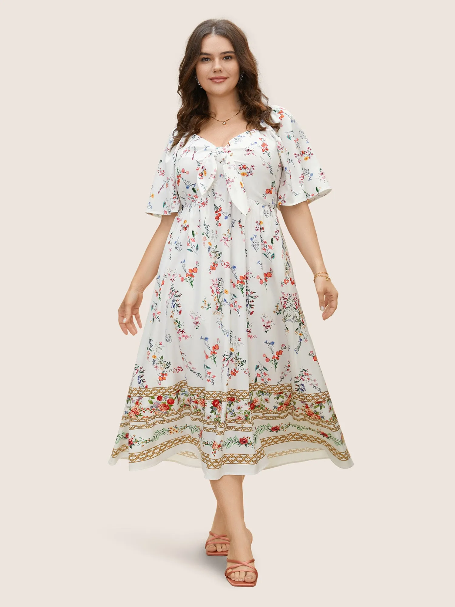 Heart Neckline Floral Print Tie Knot Dress sold by Bloomchic