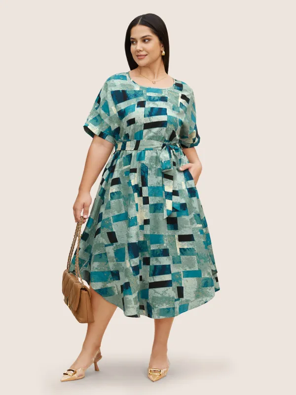 Geometric Dolman Sleeve Curved Hem Dress sold by Bloomchic