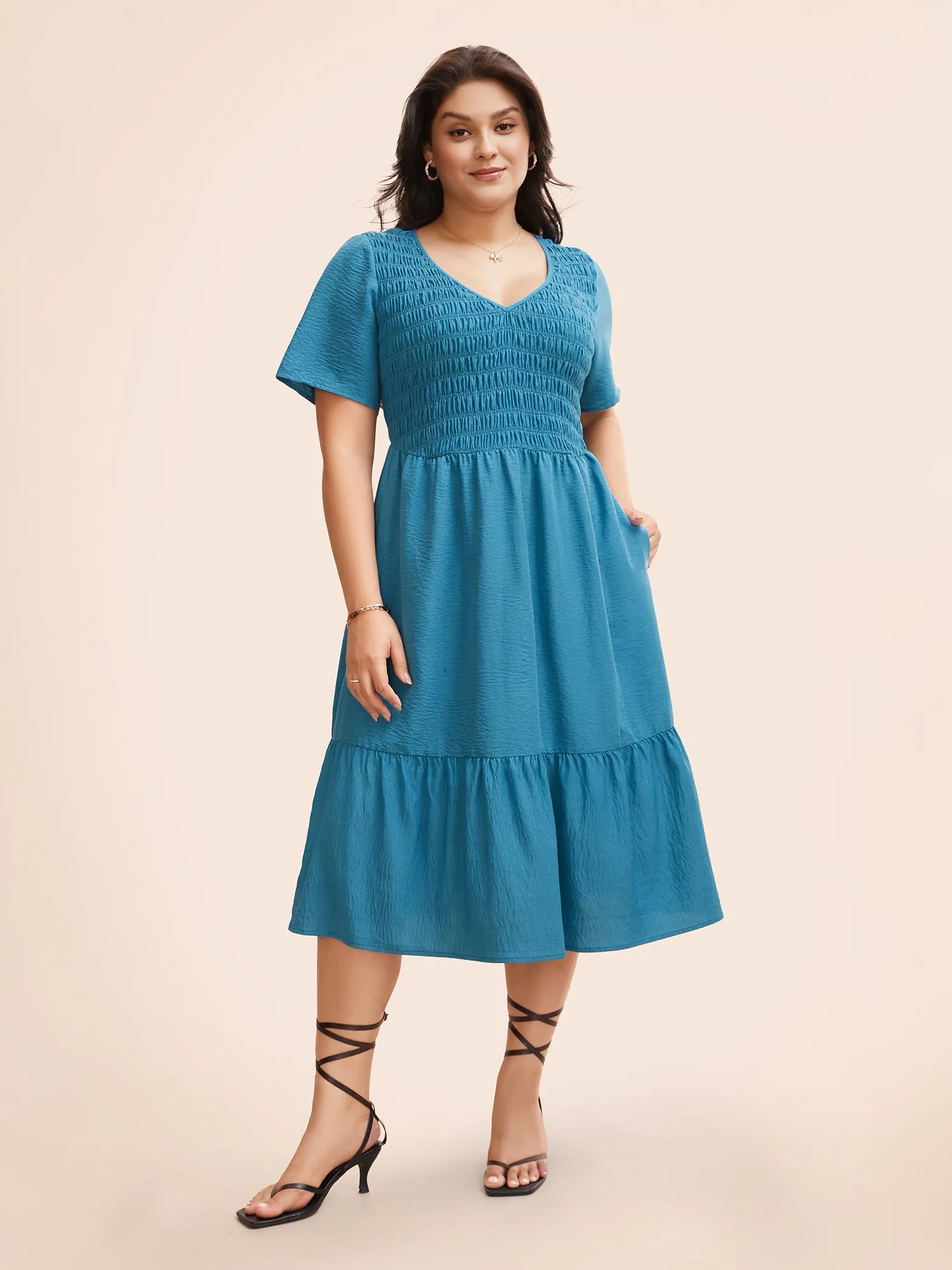 Solid Shirred Ruffle Hem Midi Dress sold by Bloomchic