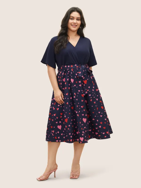 Heart Print Patchwork Belted Wrap Dress sold by Bloomchic