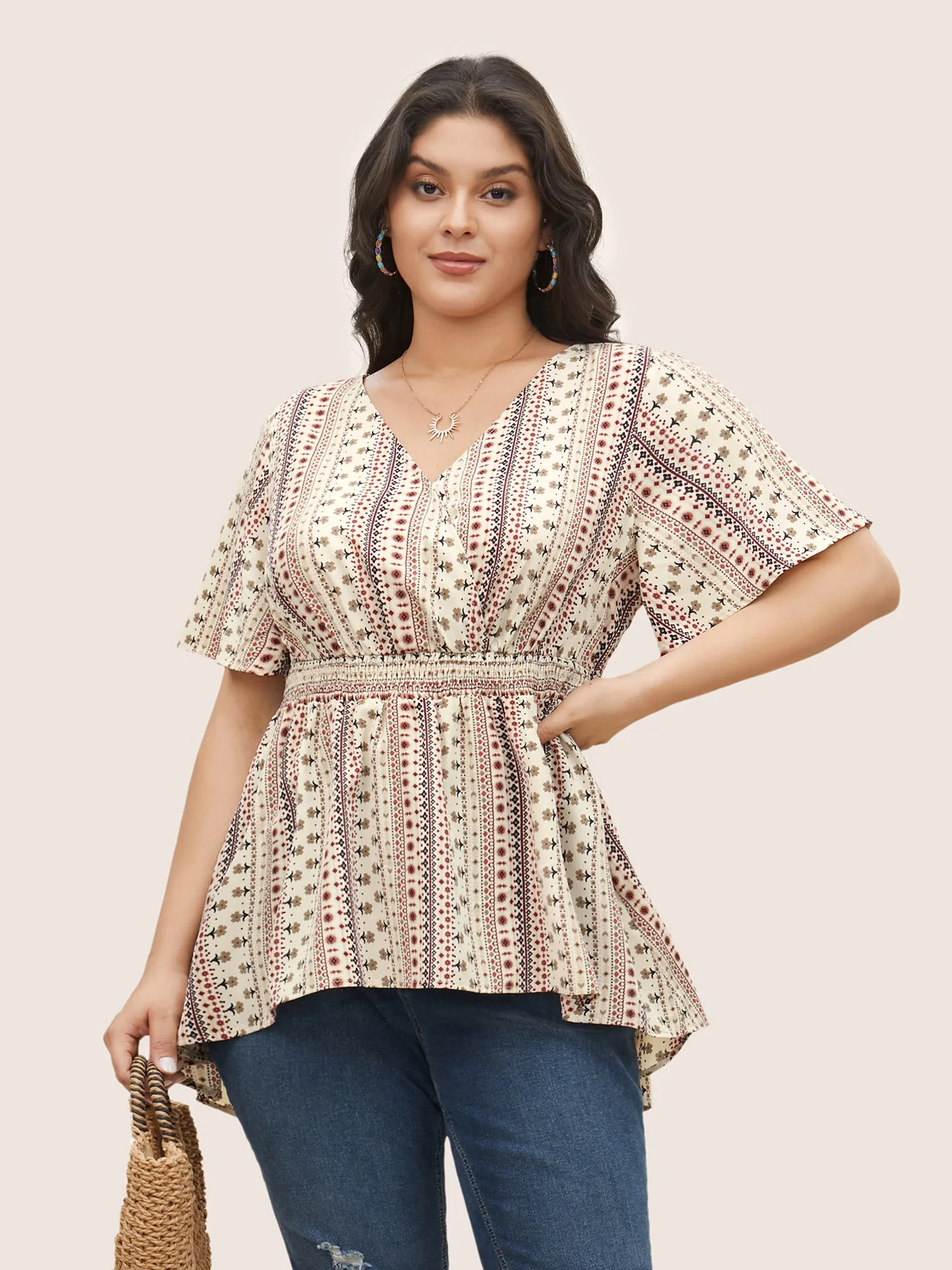 Ditsy Floral Surplice Neck Shirred Blouse sold by Bloomchic