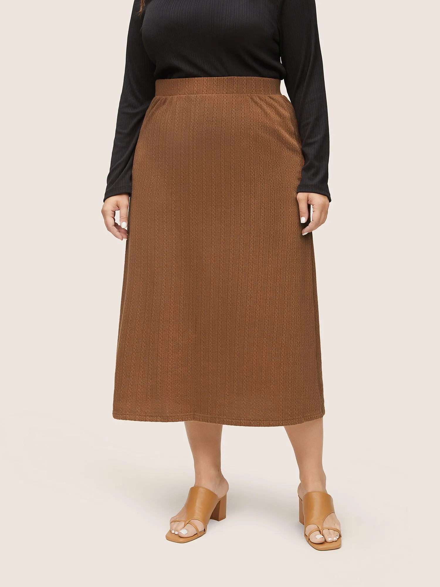 A Line Elastic Waist Knit Jacquard Skirt sold by Bloomchic