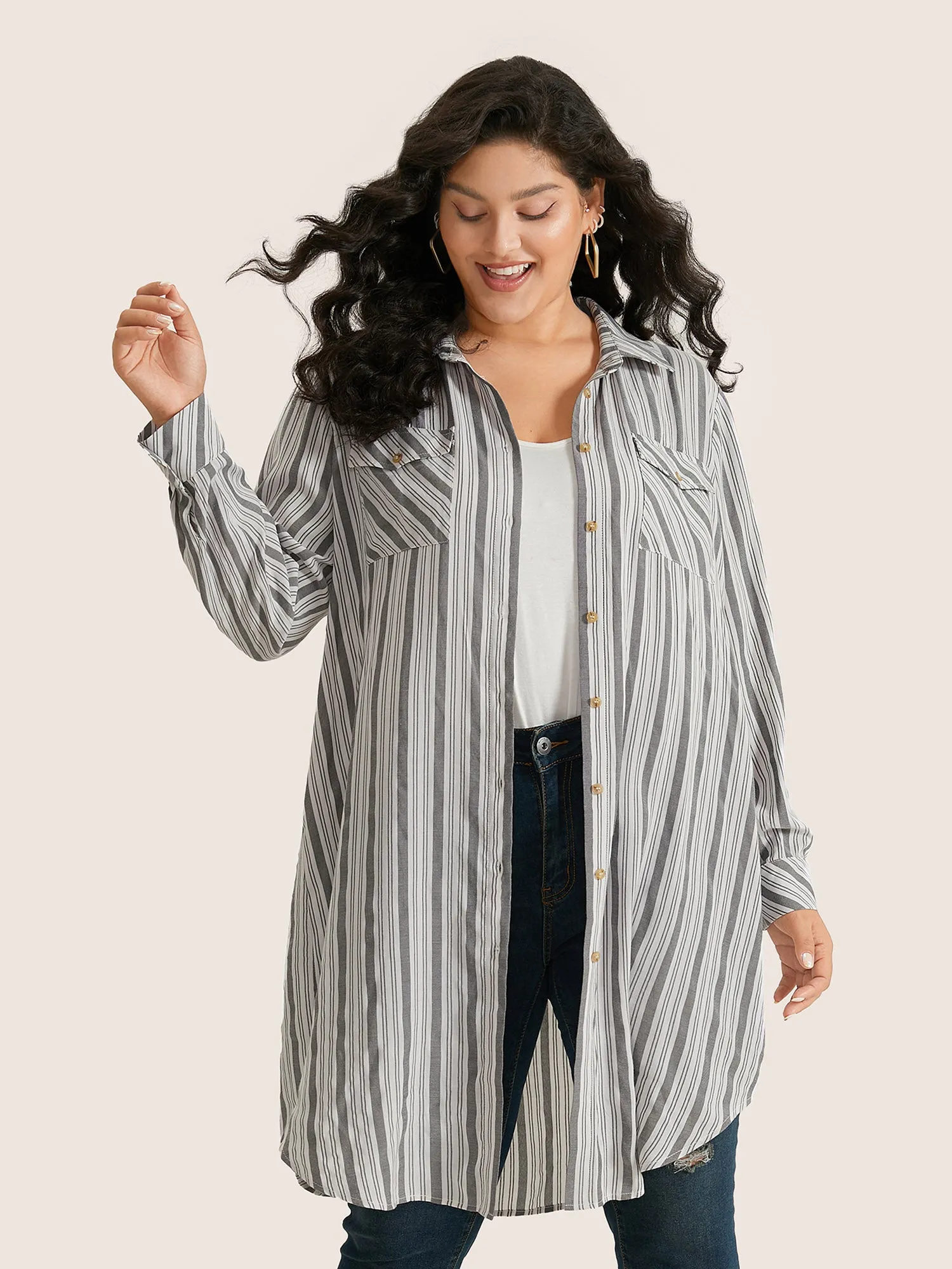 Striped Flap Detail Curved Hem Blouse sold by Bloomchic