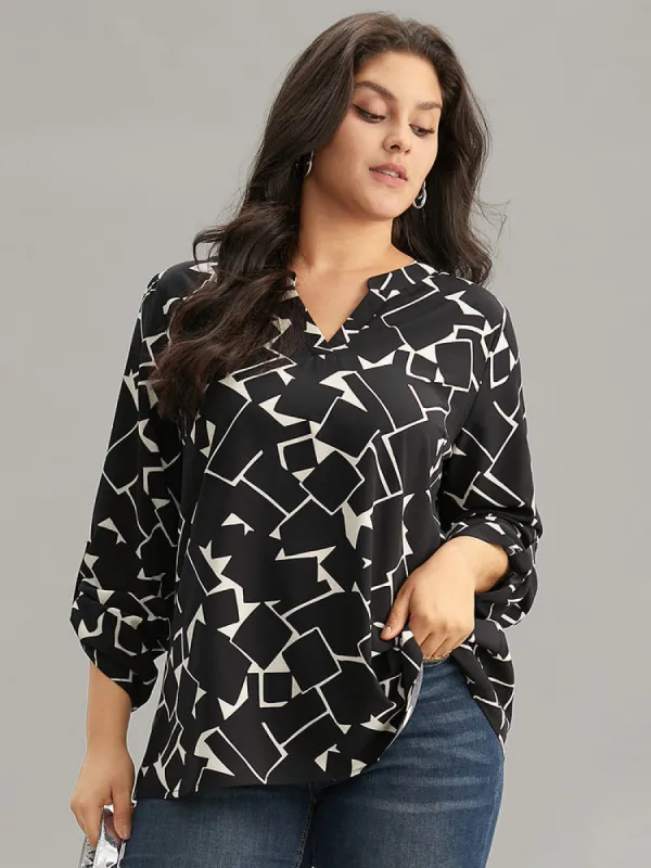 Geometric Notched Tab Sleeve Blouse sold by Bloomchic