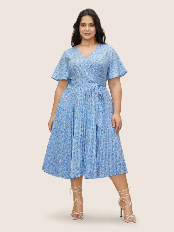 Ditsy Floral Overlapping Pleated Belted Dress sold by Bloomchic