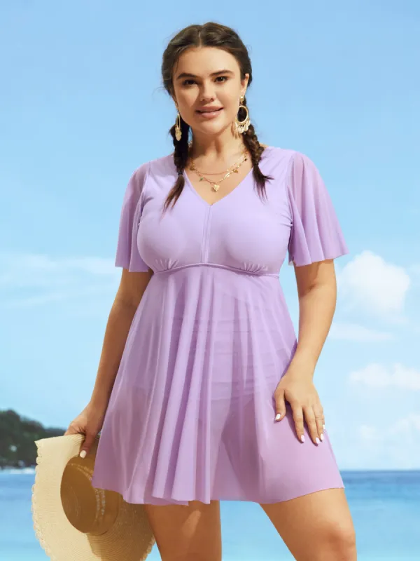 Solid Patchwork See Through Ruffle Sleeve Swim Dress sold by Bloomchic