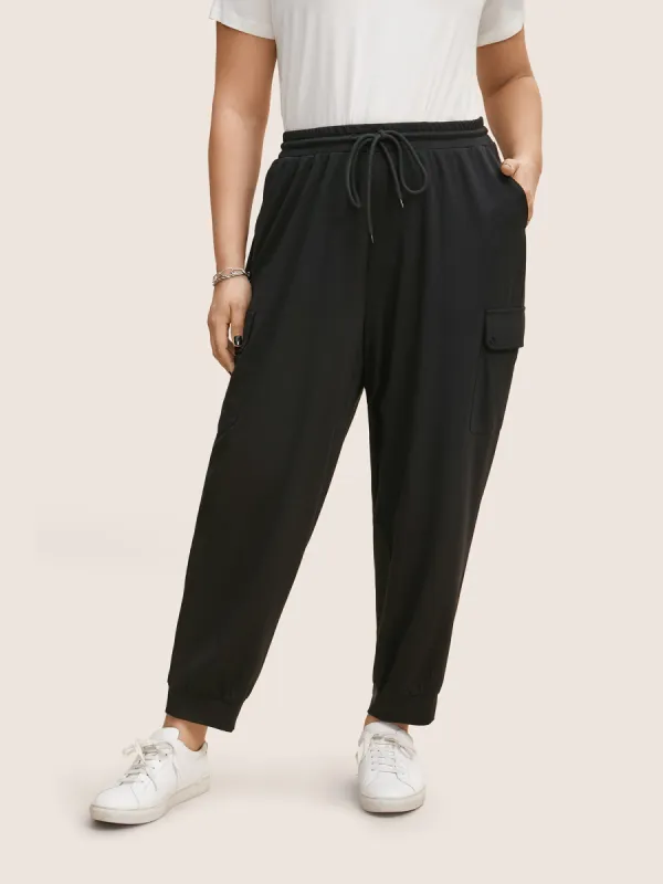Drawstring Elastic Waist Flap Pocket Carrot Pants sold by Bloomchic