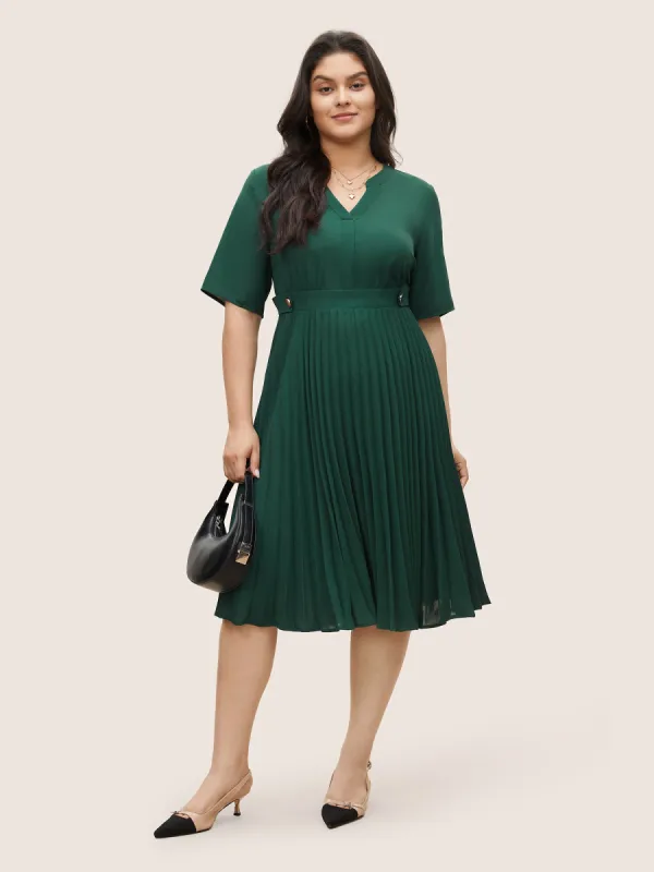 Solid Button Detail Notched Pleated Hem Dress sold by Bloomchic