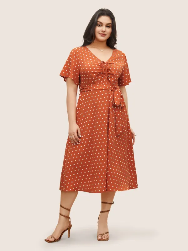 Polka Dot Drawstring Belted Ruffle Sleeve Dress sold by Bloomchic
