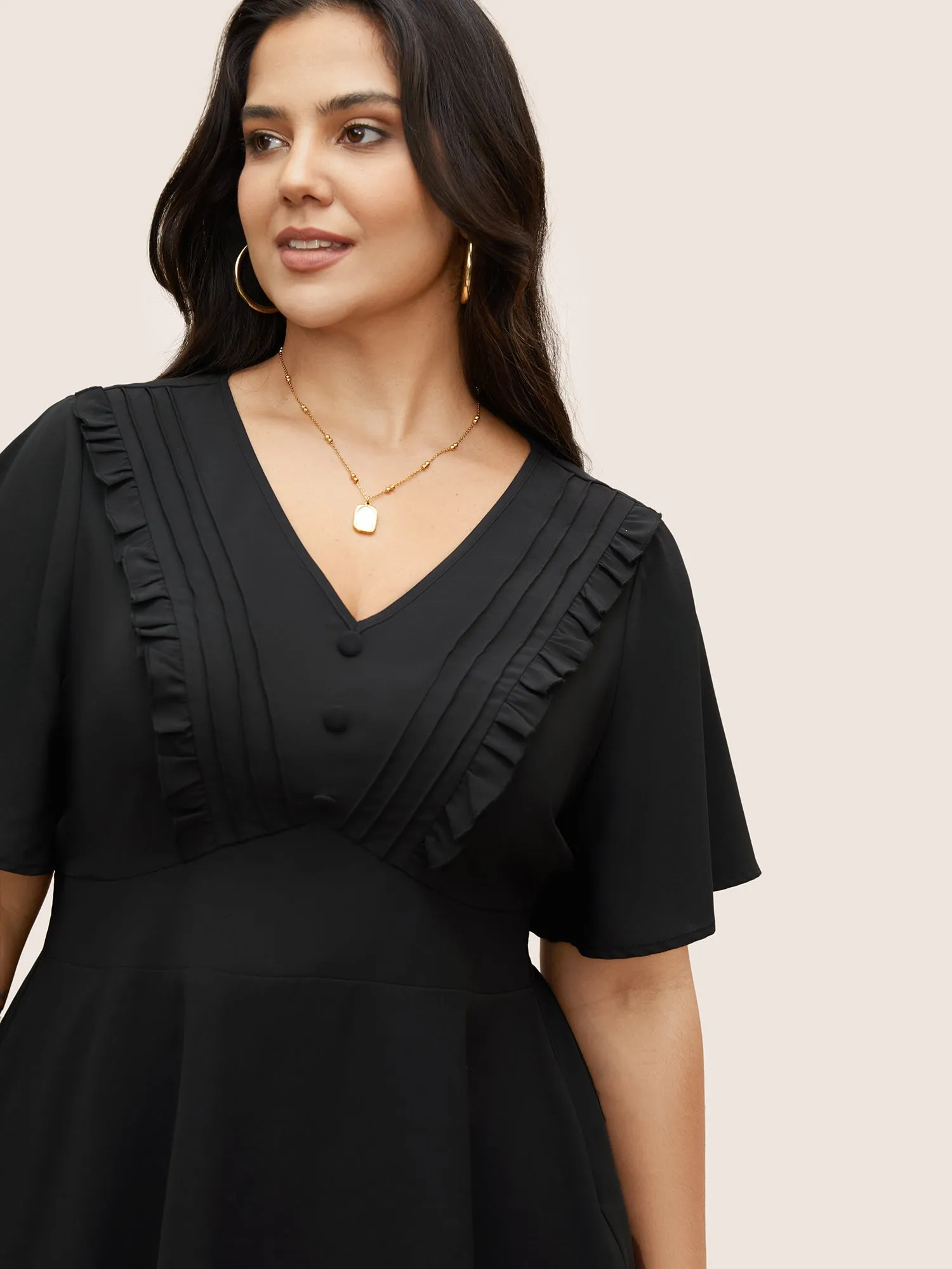 Solid Ruffle Sleeve Button Detail Blouse sold by Bloomchic product image thumbnail 3