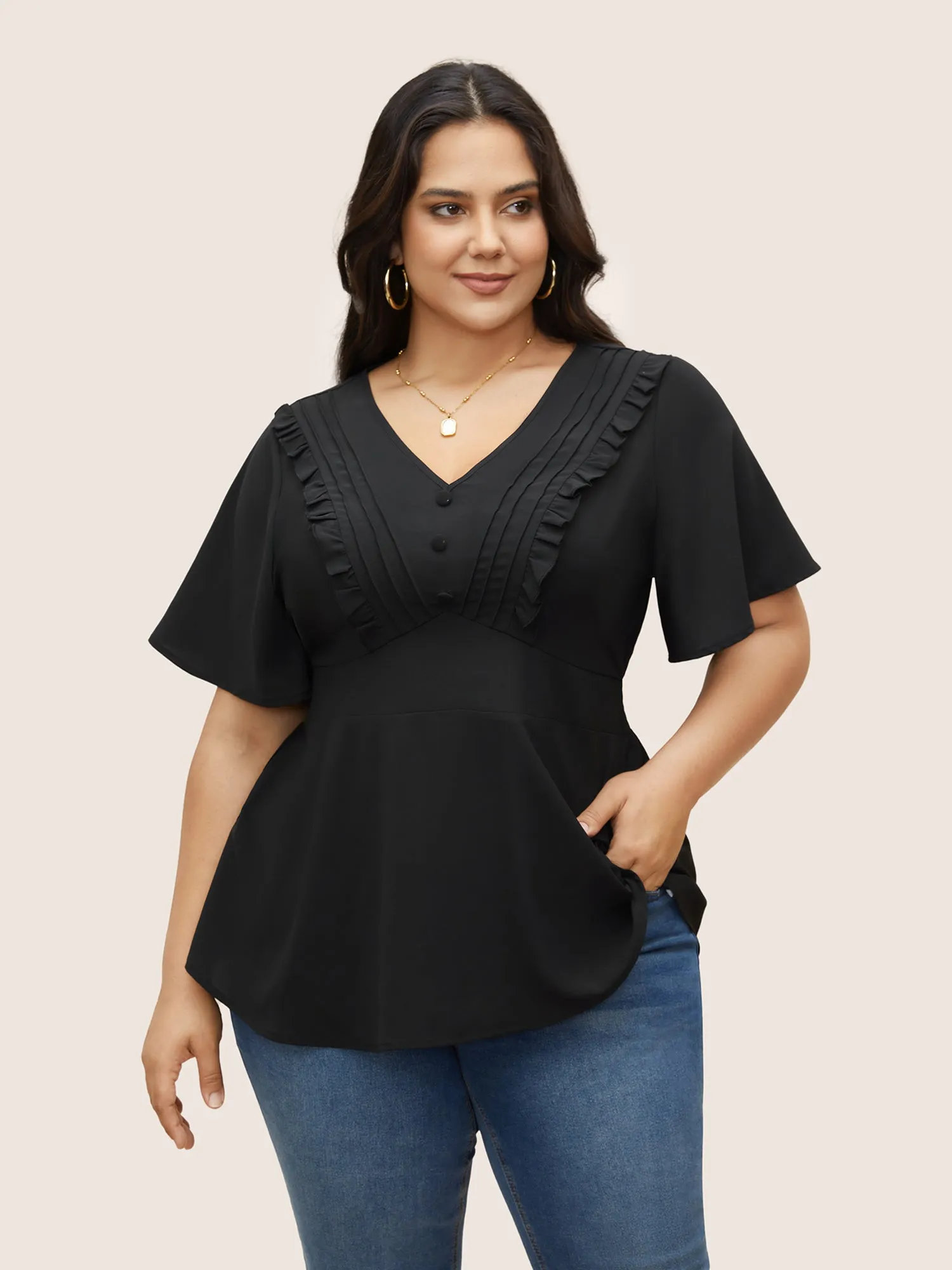 Solid Ruffle Sleeve Button Detail Blouse sold by Bloomchic