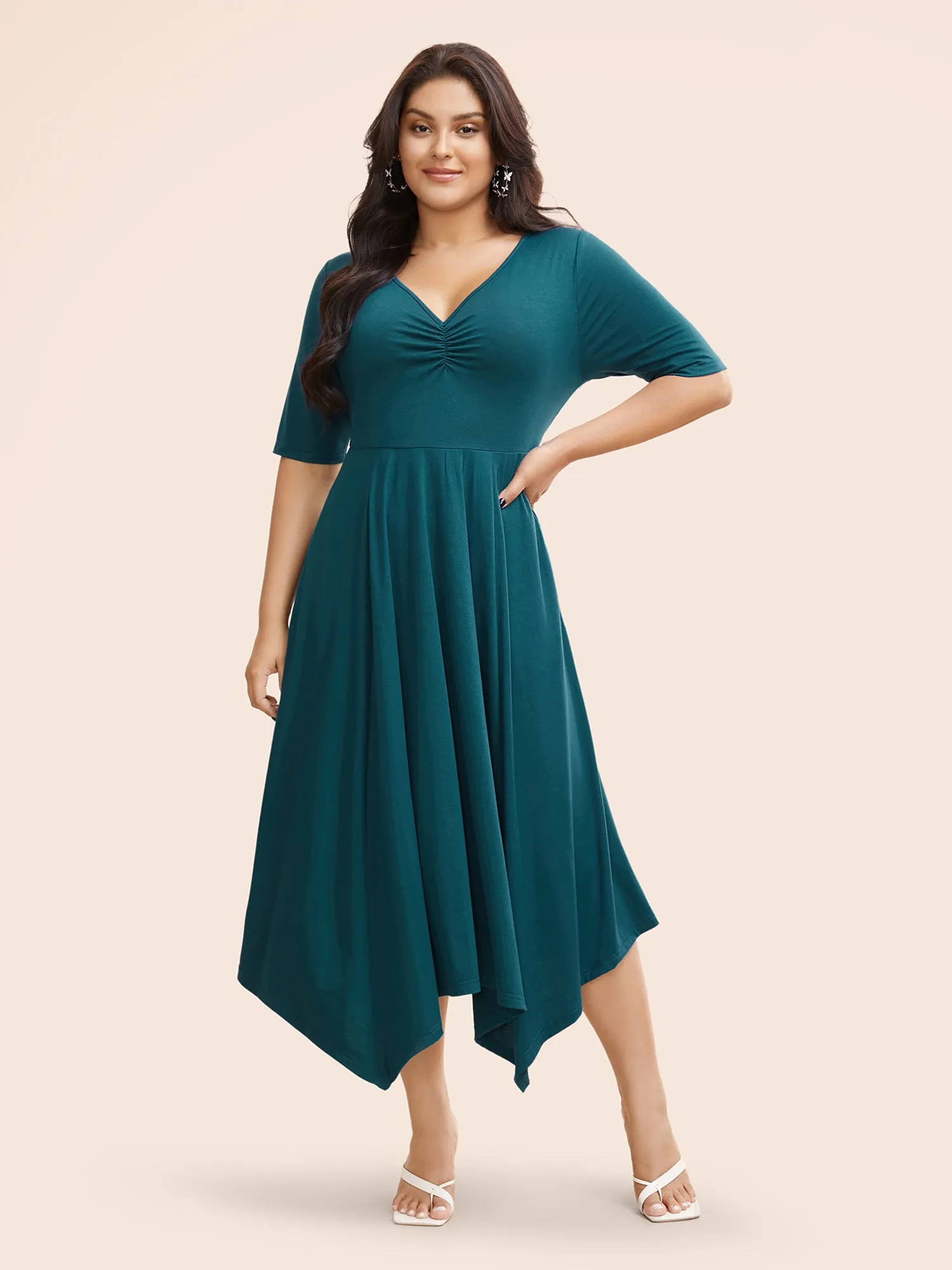 Solid Ruched Pocket Asymmetrical Hem Dress sold by Bloomchic