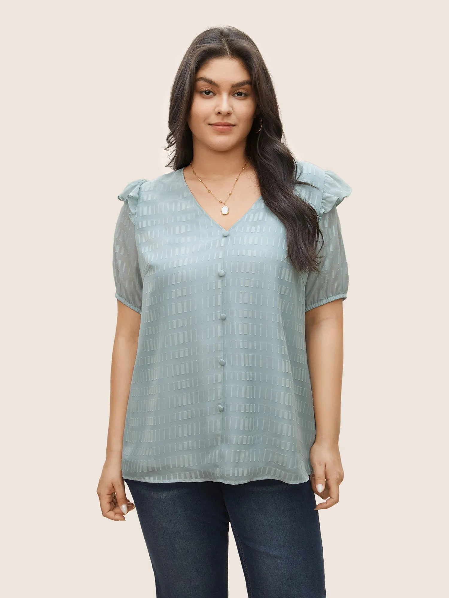 Solid Textured Gathered Ruffles Button Detail Blouse sold by Bloomchic