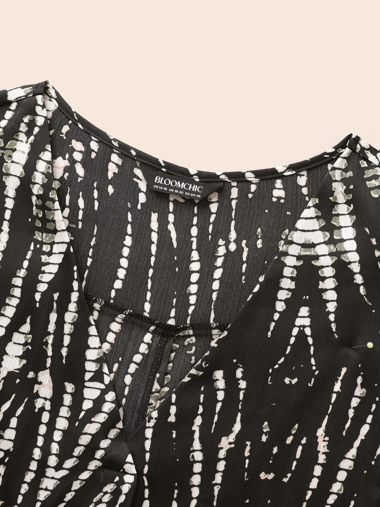 Animal Print Pleated Dolman Sleeve Blouse sold by Bloomchic product image thumbnail 5