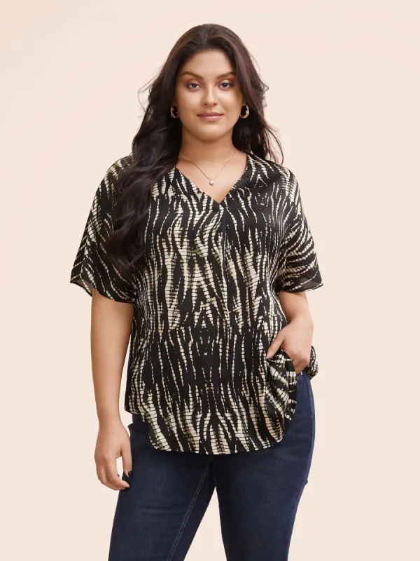 Animal Print Pleated Dolman Sleeve Blouse sold by Bloomchic