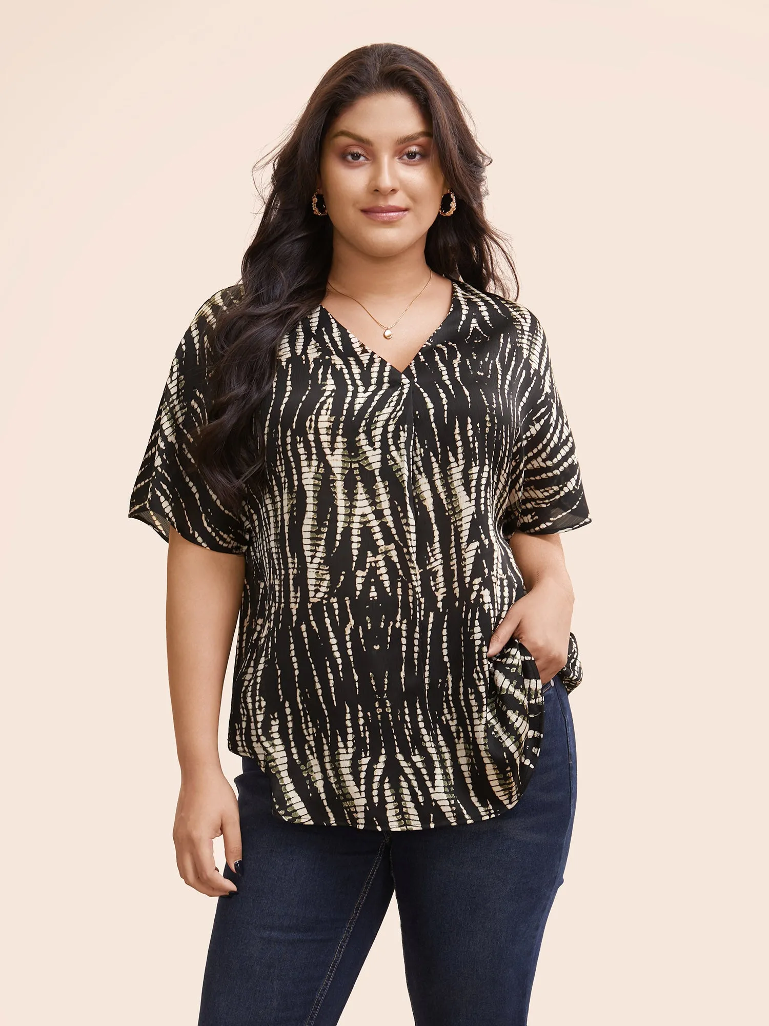 Animal Print Pleated Dolman Sleeve Blouse sold by Bloomchic