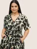 Overlap Collar Geometric Belted Dress sold by Bloomchic