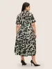 Overlap Collar Geometric Belted Dress sold by Bloomchic