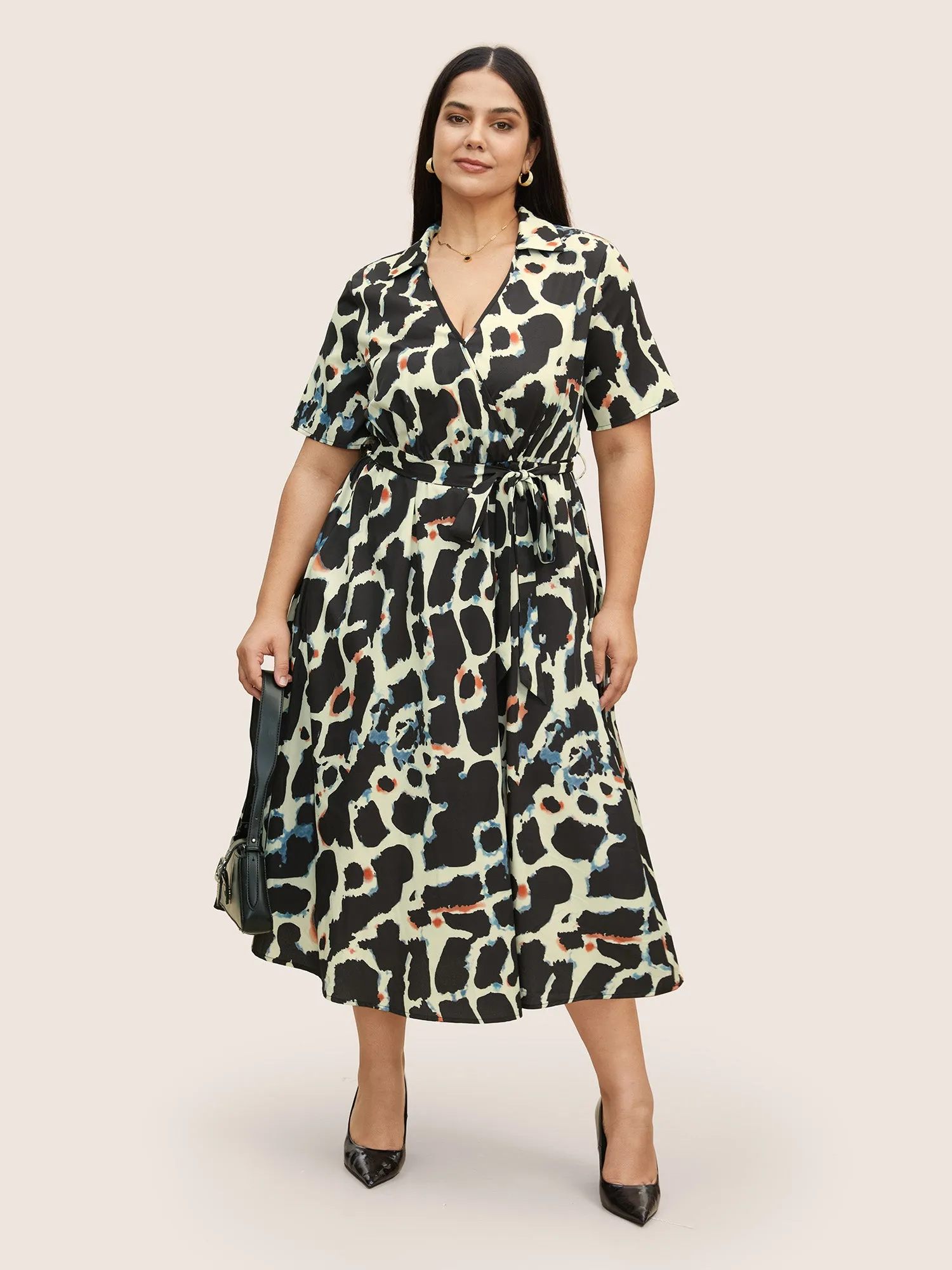 Overlap Collar Geometric Belted Dress sold by Bloomchic