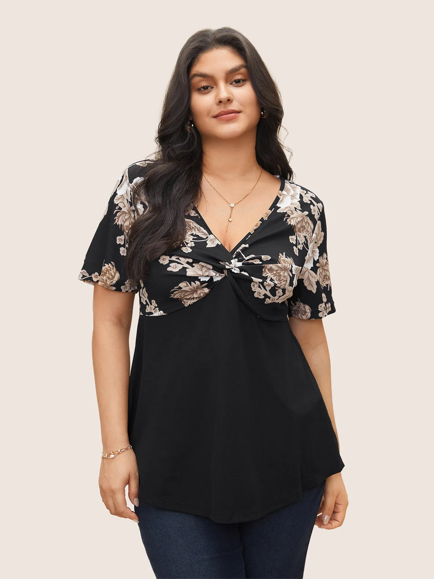 Floral Twist Front Asymmetrical Hem T-shirt sold by Bloomchic