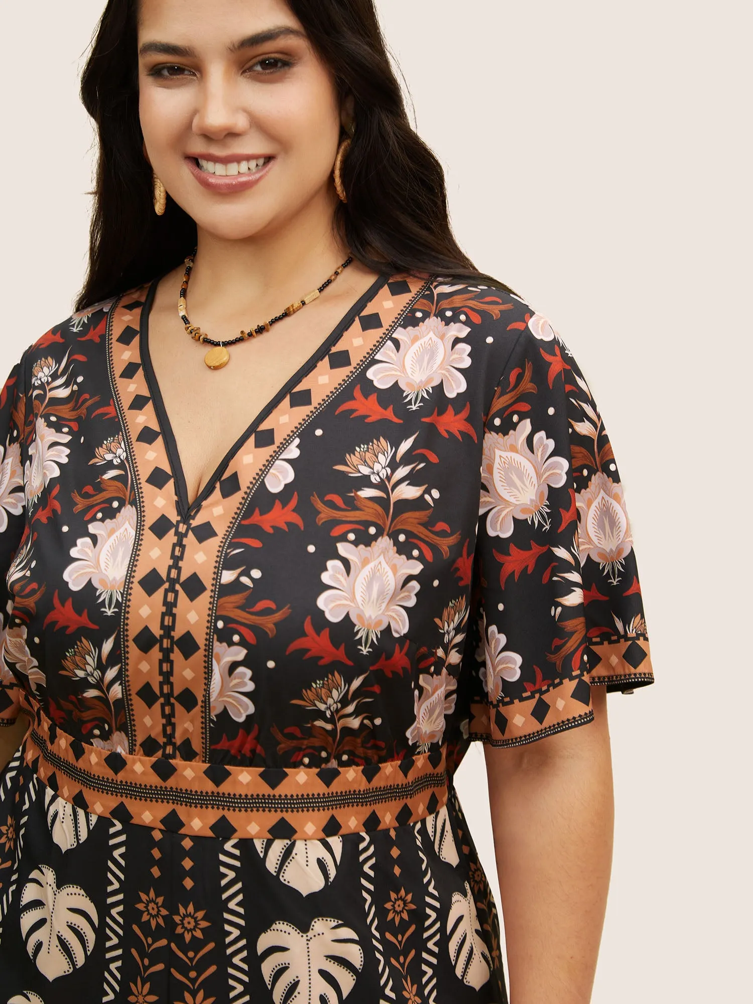 V Neck Bandana Print Flutter Sleeve Jumpsuit sold by Bloomchic product image thumbnail 4