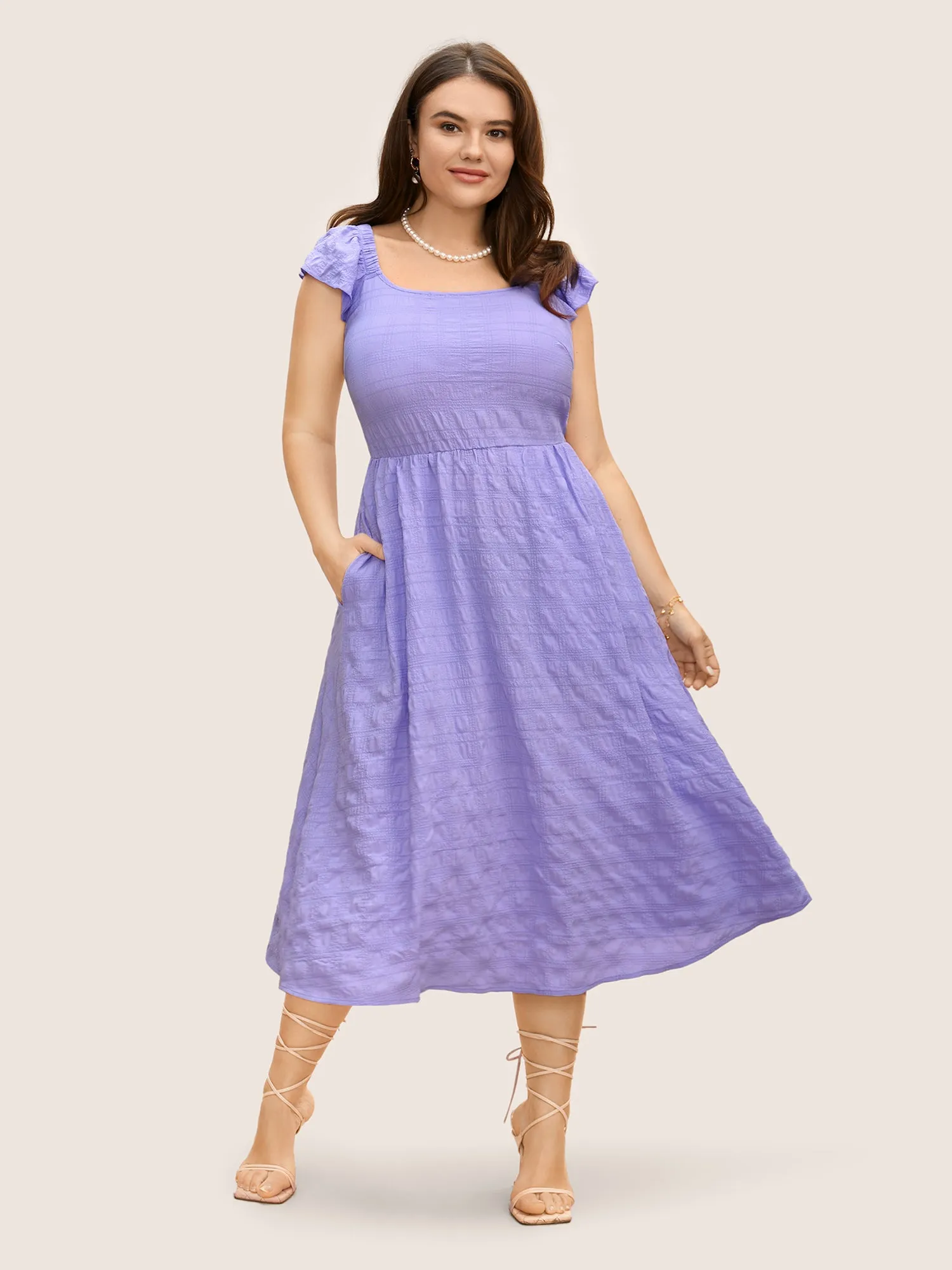 Texture Back Tie Knot Cap Sleeve Dress sold by Bloomchic product image thumbnail 4