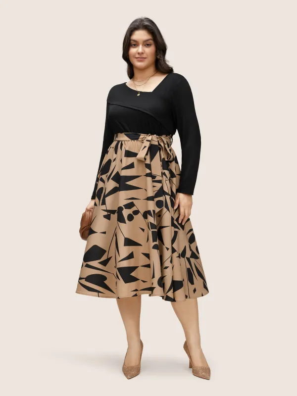 Geometric Contrast Patchwork Asymmetrical Neck Belted Dress sold by Bloomchic