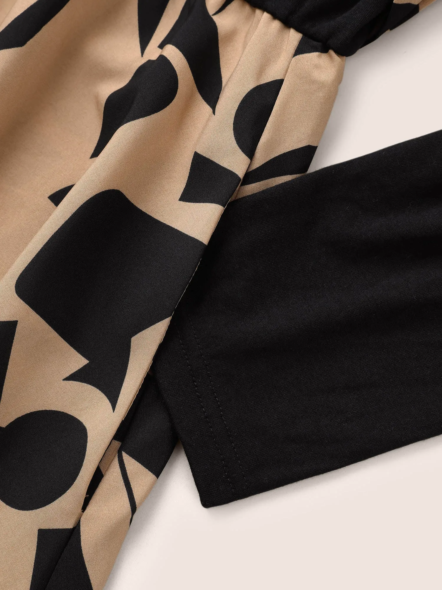 Geometric Contrast Patchwork Asymmetrical Neck Belted Dress sold by Bloomchic product image thumbnail 5