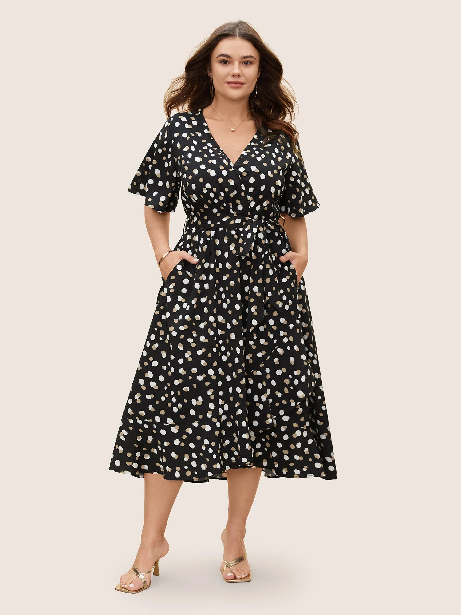 Allover Print Wrap Flutter Sleeve Midi Dress sold by Bloomchic