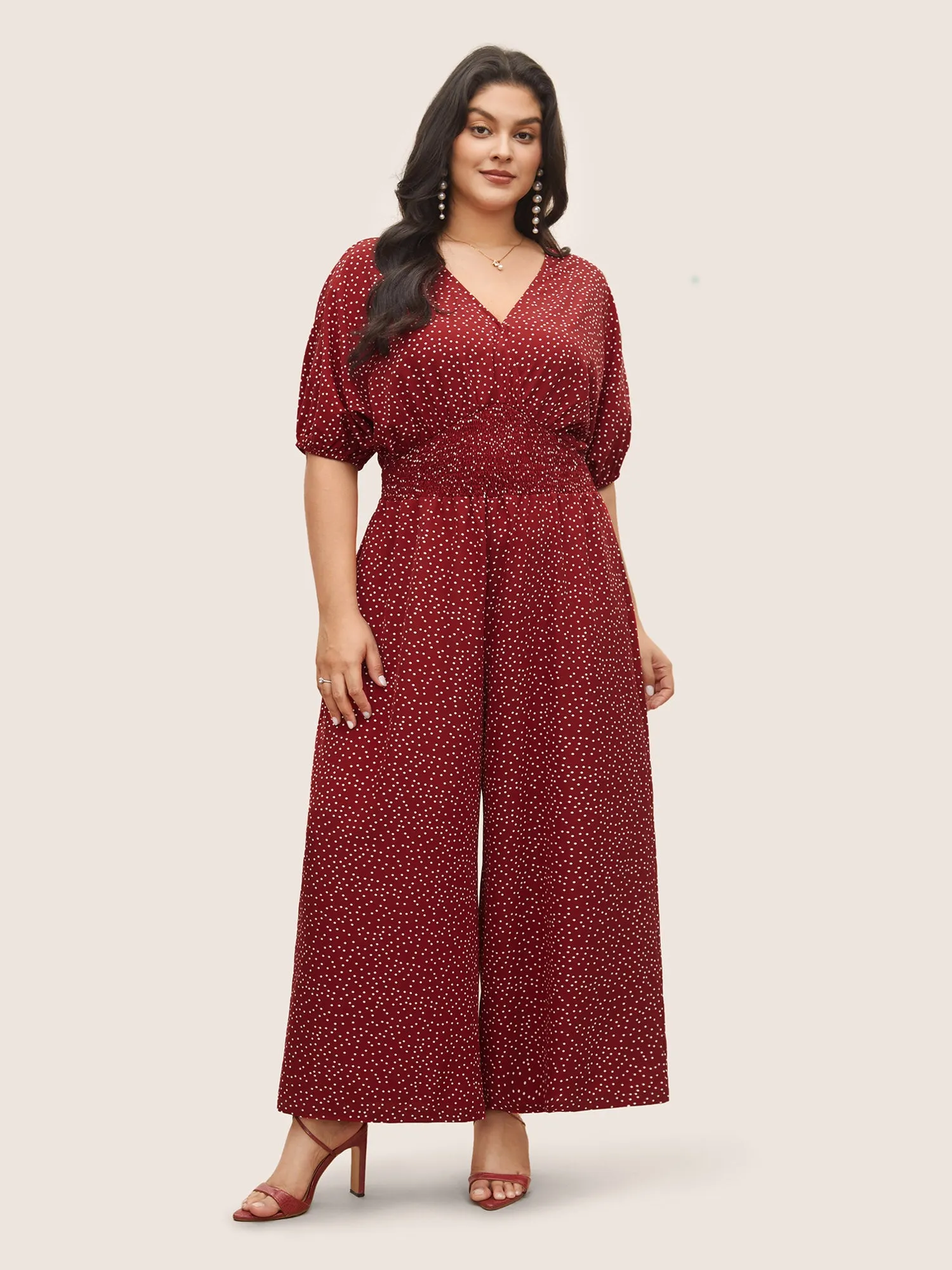 Polka Dot Overlap Collar Shirred Jumpsuit sold by Bloomchic