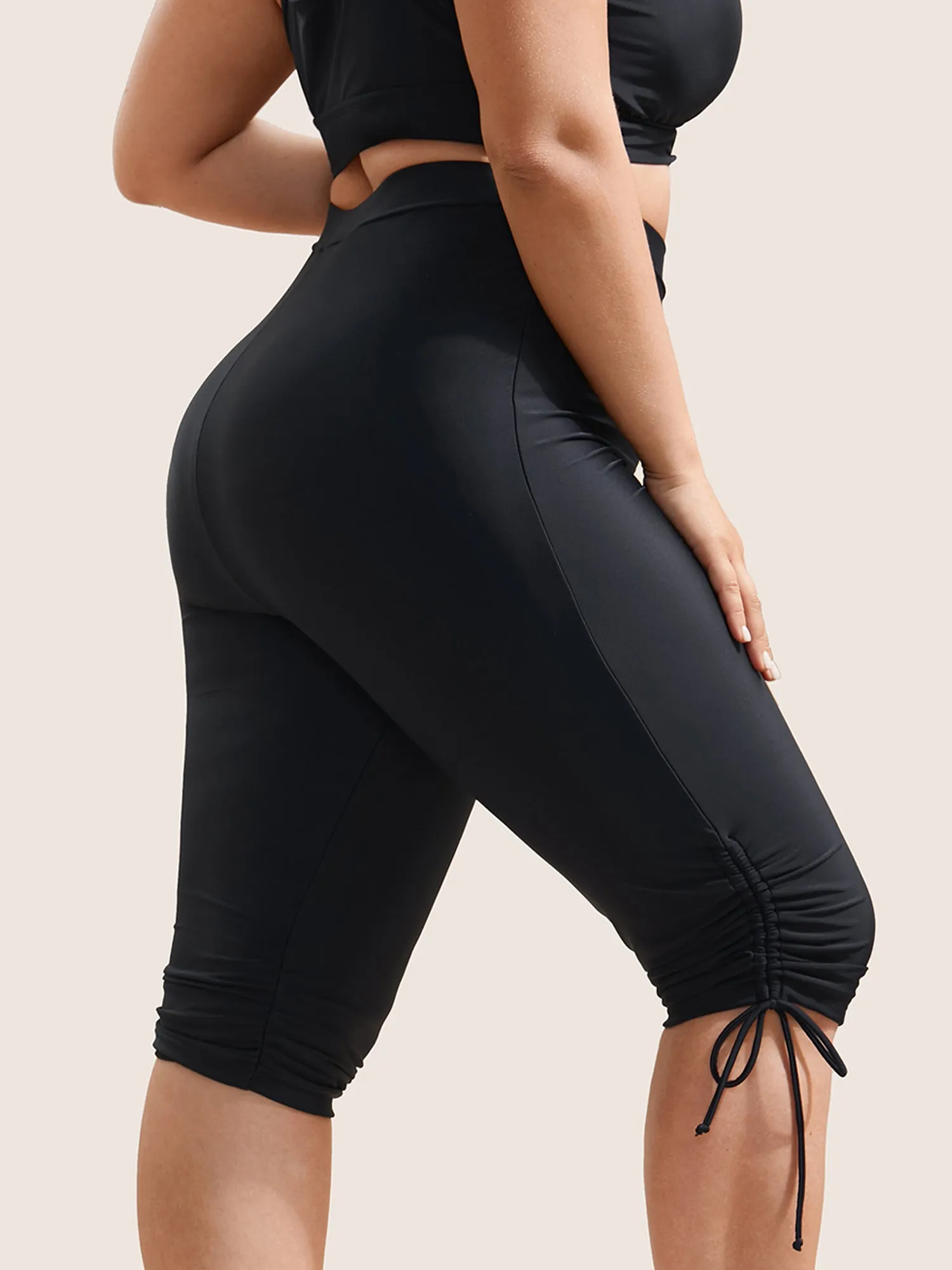 Solid High Rise Drawstring Side Swim Bottom sold by Bloomchic