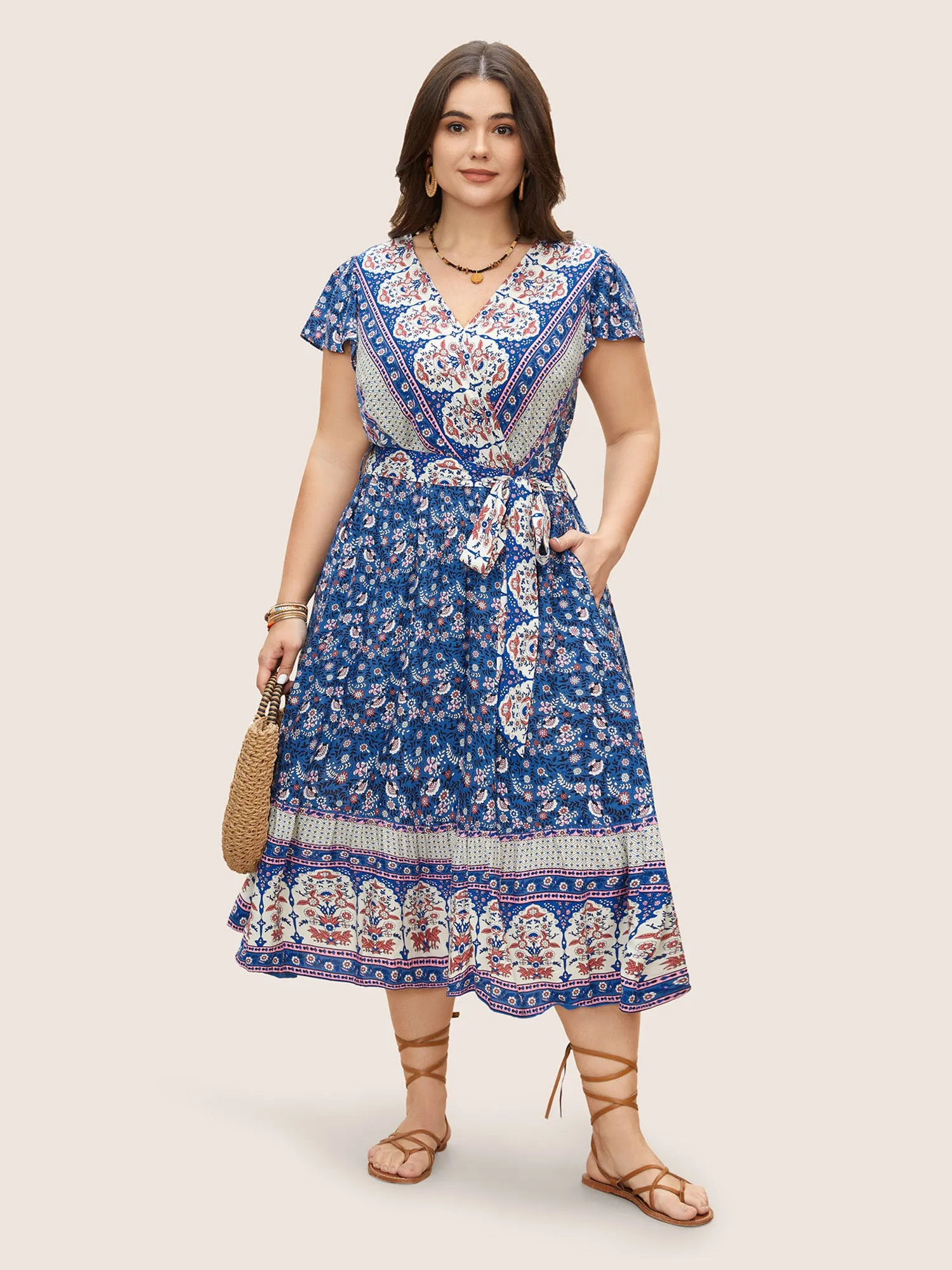 Boho Print Surplice Neck Belted Dress sold by Bloomchic