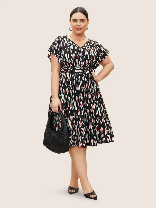 Allover Print Surplice Neck Flutter Sleeve Dress sold by Bloomchic