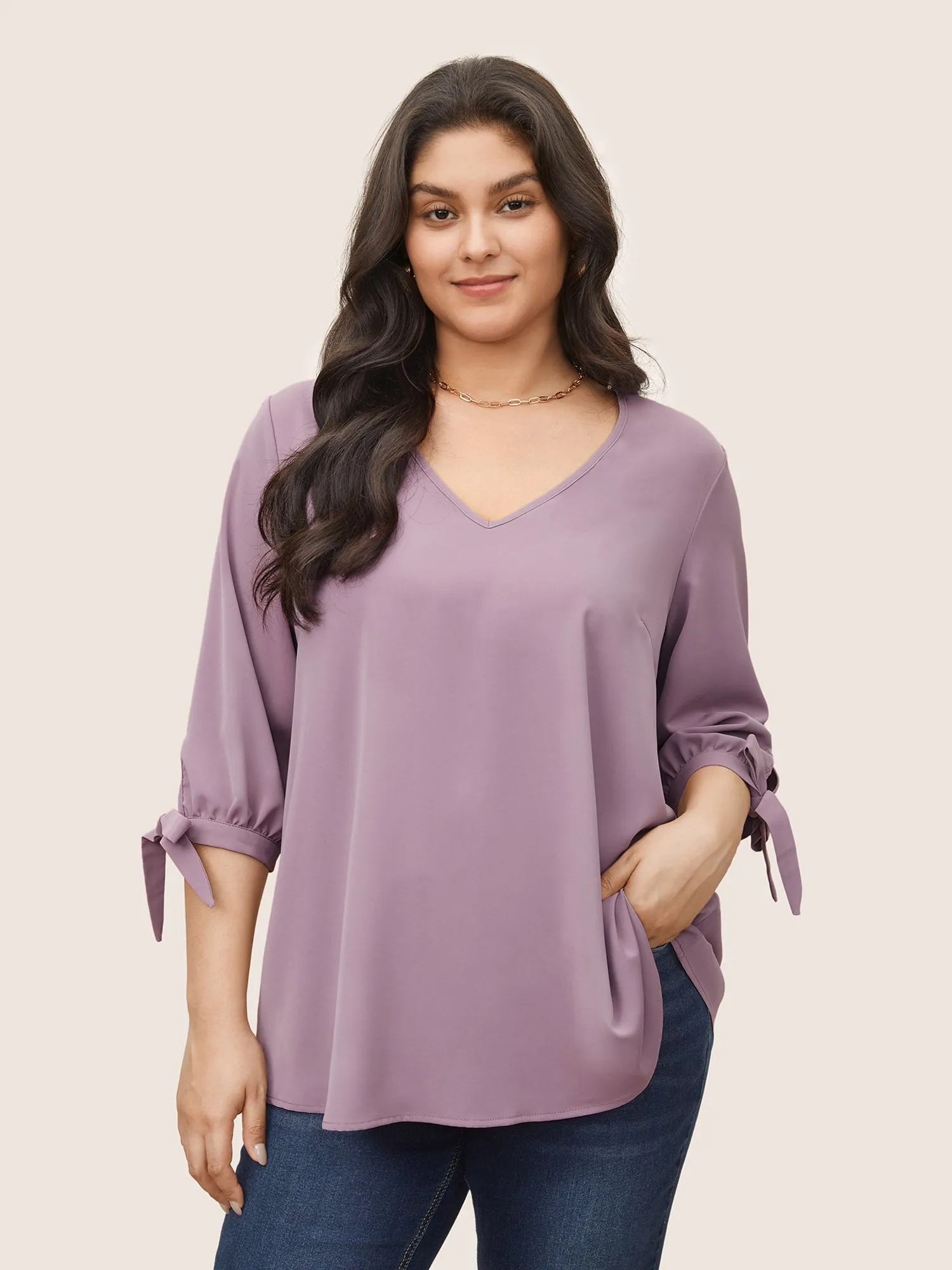 Plain Knotted Sleeve V Neck Blouse sold by Bloomchic
