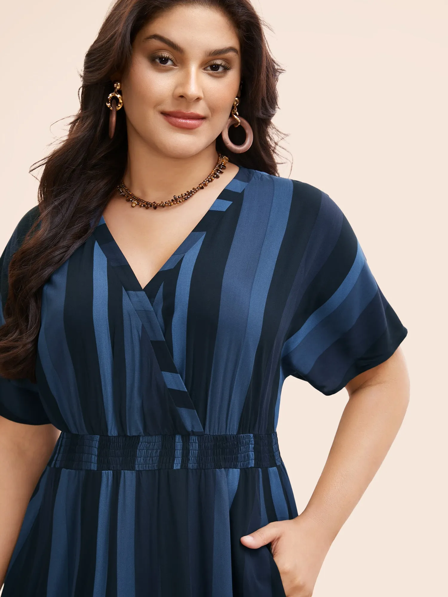 Striped Dolman Sleeve Pocket Shirred Flutter Wrap Dress sold by Bloomchic product image thumbnail 2