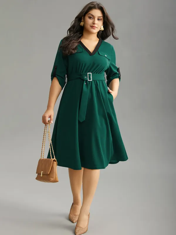 Solid Contrast Trim Belted Flap Detail Dress sold by Bloomchic