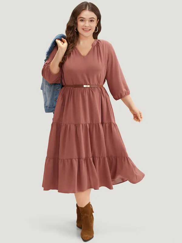 Solid Notched Lantern Sleeve Layered Hem Dress sold by Bloomchic