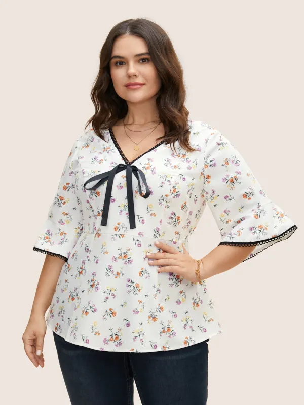 Floral Print Bowknot Bell Sleeve Blouse sold by Bloomchic