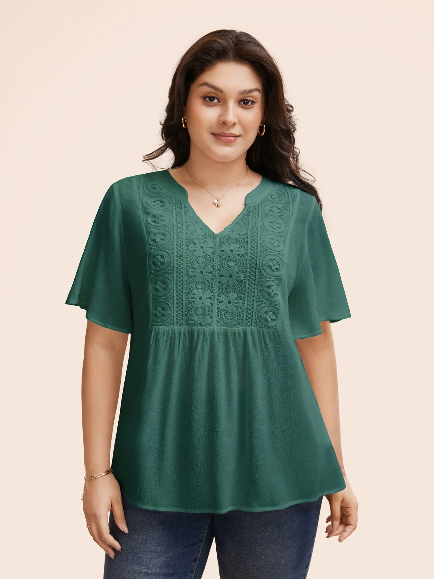 Notched Collar Texture Slit Hem Blouse sold by Bloomchic