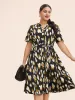 Brush Print Notched Belted Ruffle Sleeve Dress sold by Bloomchic