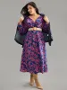 Floral Twist Front Pocket Lantern Sleeve Dress sold by Bloomchic
