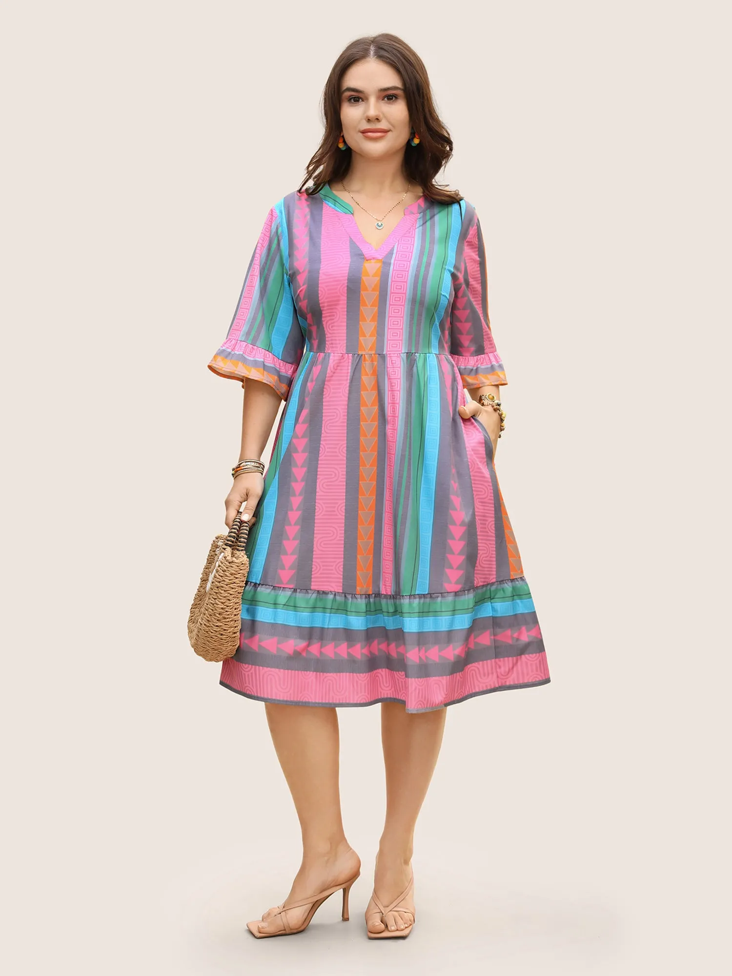 Notched Collar Geometric Striped Ruffle Sleeve Dress sold by Bloomchic