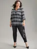 Plaid Notched Button Up Tab Sleeve Blouse sold by Bloomchic