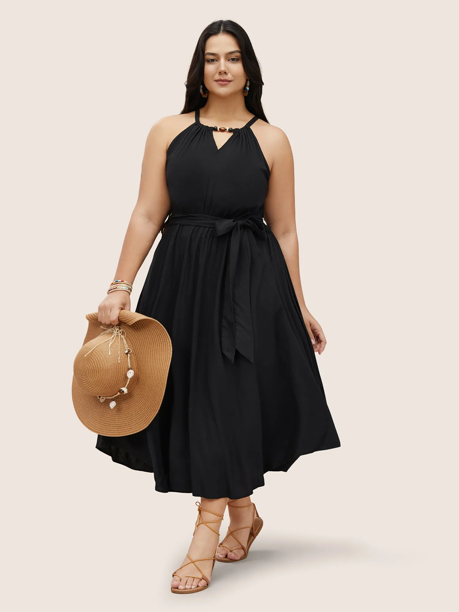 Solid Keyhole Halter Neck Belted Dress sold by Bloomchic