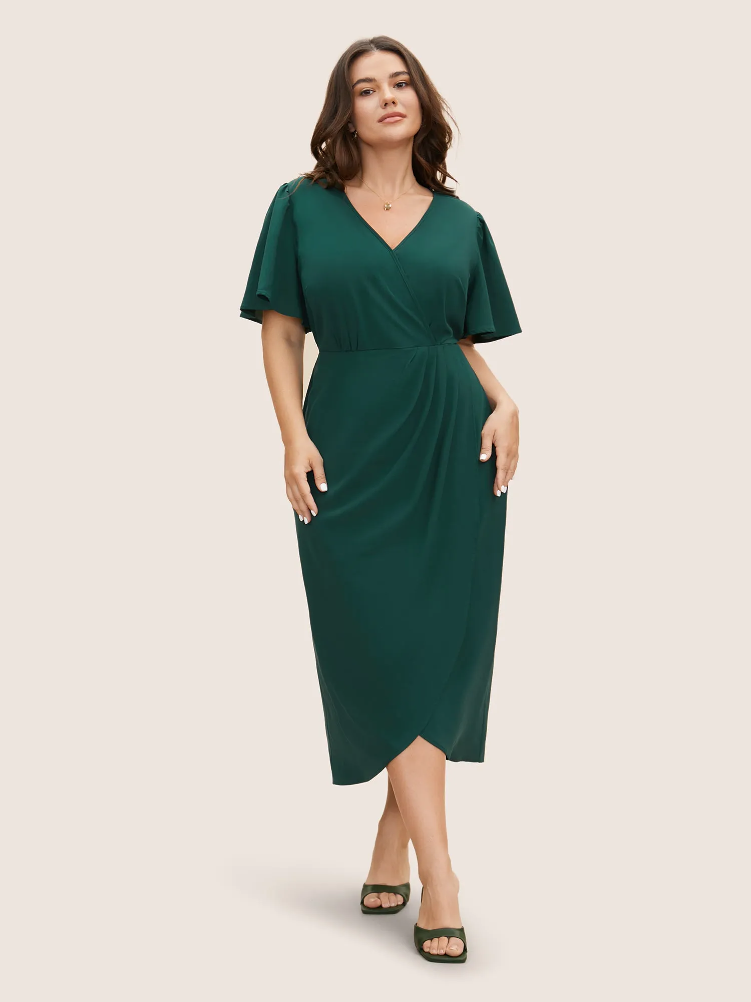 Solid Pleated Ruffle Sleeve Wrap Hem Dress sold by Bloomchic